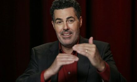 Another One Bites the Dust: Adam Carolla Blasts Newsom As ‘Slippery Eel of Nothingness’ As He Exits CA