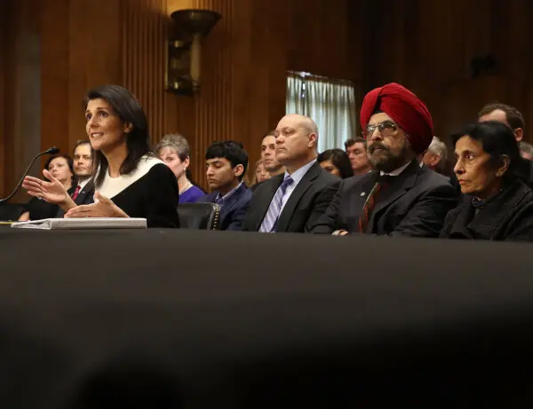 Gov. Nikki Haley, (R-S.C.), speaks, as her father and mother listen in the background, during a hearing on Capitol Hill in Washington, on Jan. 18, 2017. (Mark Wilson/Getty Images)