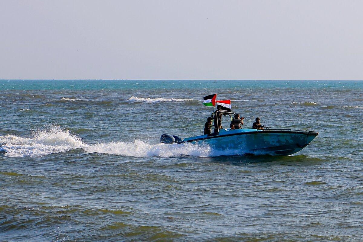 Yemeni Coast Guard affiliated with the Houthi group patrol the waters as demonstrators march in the Red Sea port of Hodeida in solidarity with the people of Gaza on Jan. 4, 2024. (AFP via Getty Images)