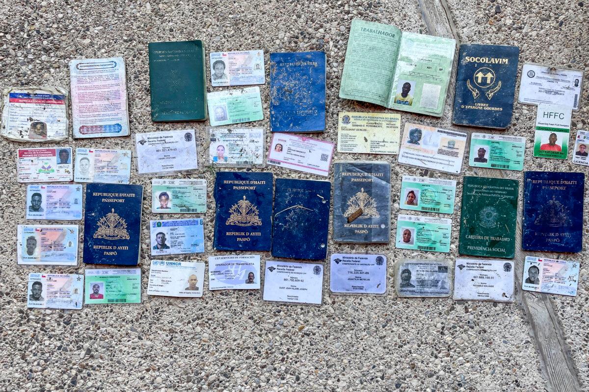 Passports, visas, and identification cards as seen in a file photo. (Charlotte Cuthbertson/The Epoch Times)