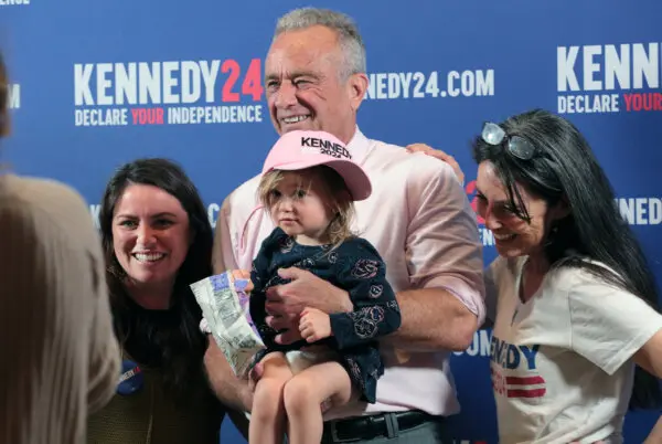 Robert F. Kennedy Jr. poses for a selfie with supporters after a voter rally in Holbrook, N.Y., on April 28, 2024,. (Richard Moore/The Epoch Times)
