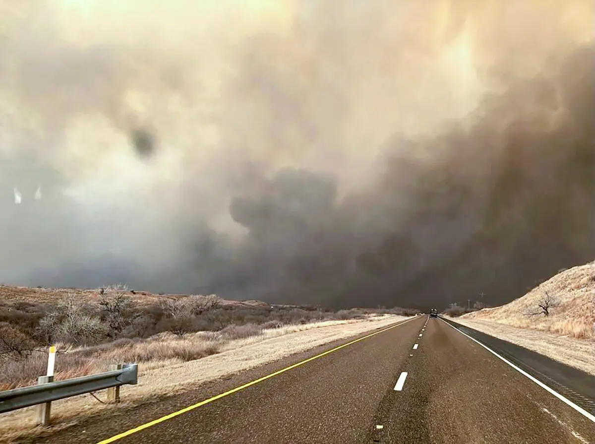 Smoke billows over a road during the Smokehouse Creek Fire in the Texas panhandle on Feb. 27, 2024. (Texas A&M Forest Service via Getty Images)