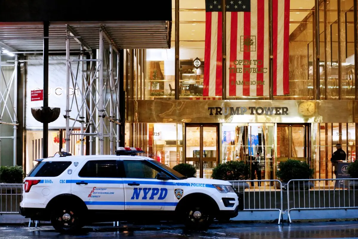 An NYPD police patrol car sits outside Trump Tower in New York on March 27, 2023. (Leonardo Munoz/AFP via Getty Images)