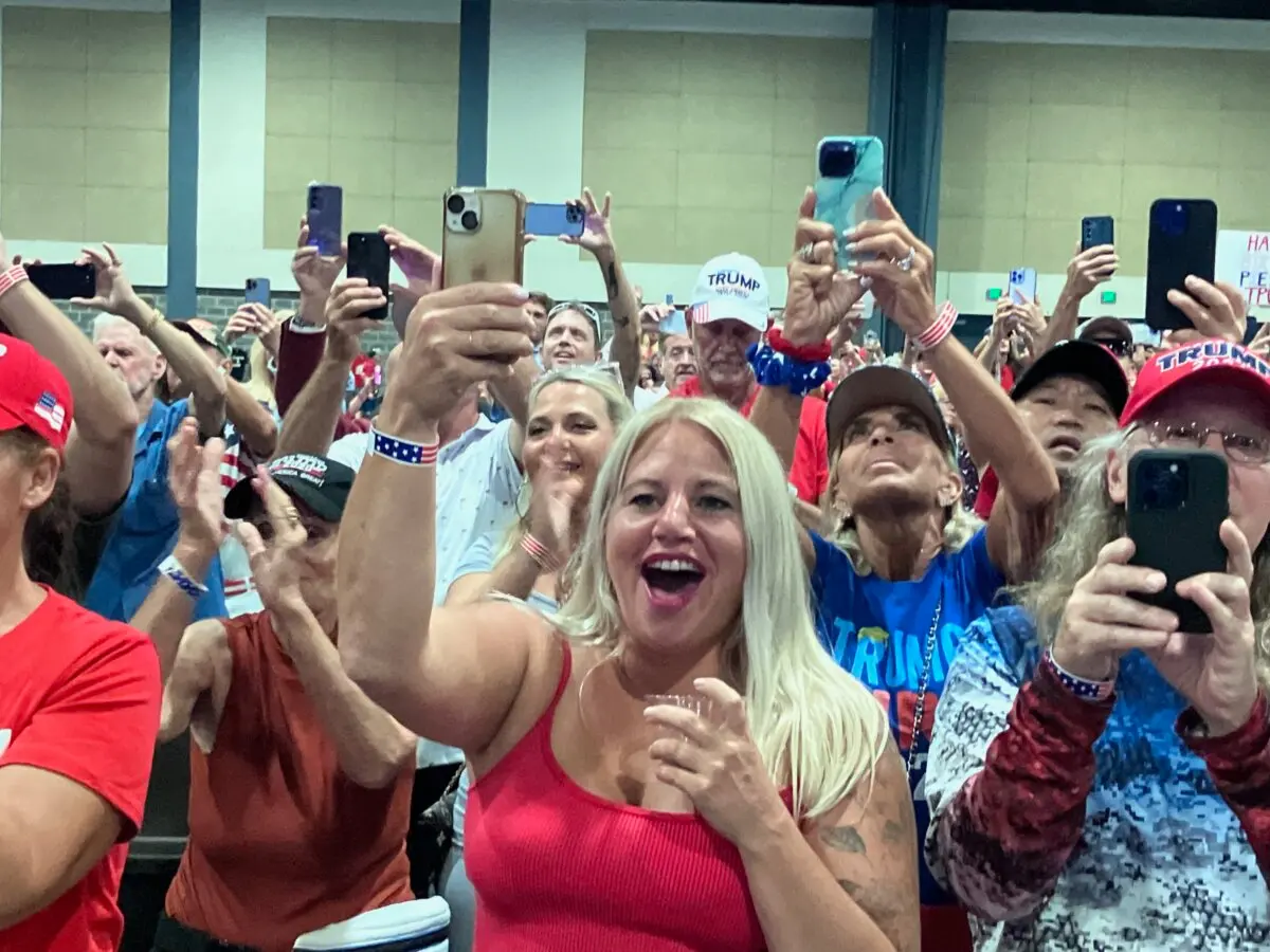 Trump supporters react as former President Donald Trump arrives at a celebration of Flag Day and his 78th birthday at the Palm Beach County Convention Center in West Palm Beach, Fla., on June 14, 2024. (Janice Hisle/The Epoch Times)