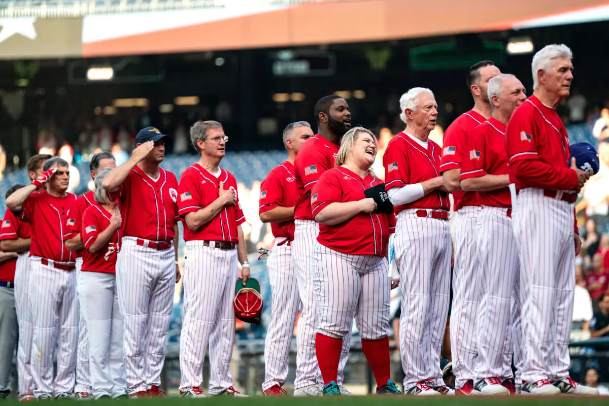 Members of the Republican team stand during the singing of the National anthem during the Congressional Baseball Game for Charity at Nationals Park on June 12, 2024, in Washington. (Kent Nishimura/Getty Images)