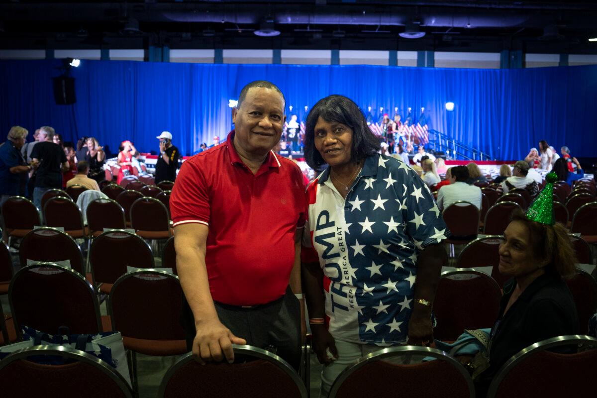 Fritz Seide, 69, and his wife, Judith Seide, 67, natives of Haiti who now live in Wellington, Fla., attend former President Donald J. Trump’s birthday party event at the Palm Beach County Convention Center in West Palm Beach, Fla., on June 14, 2024. (Madalina Vasiliu/The Epoch Times)