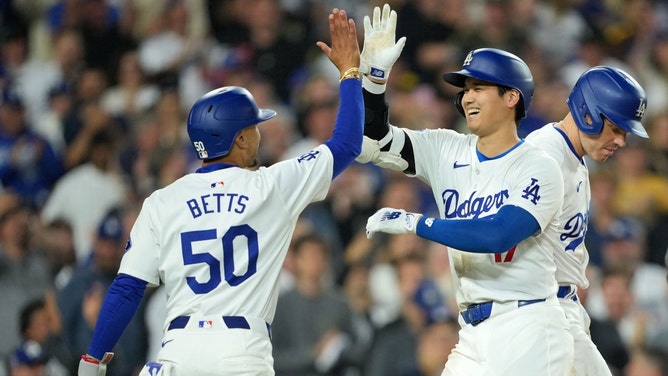 Los Angeles Dodgers DH Shohei Ohtani celebrates a two-run homer with SS Mookie Betts at Dodger Stadium. (Kirby Lee-USA TODAY Sports)