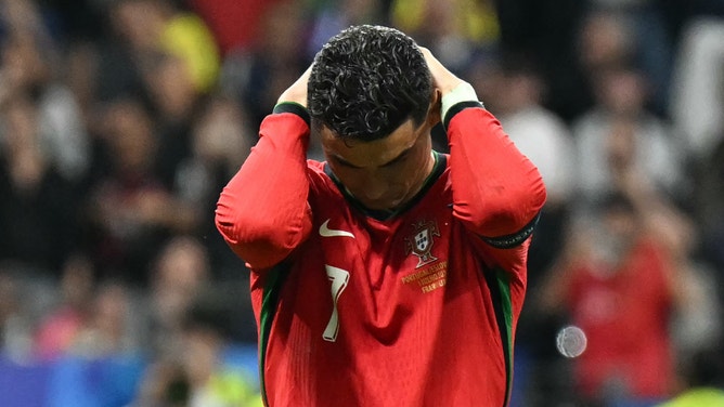 Portugal striker Cristiano Ronaldo reacts after failing to score a penalty kick during the UEFA Euro 2024 Round of 16 match between Portugal and Slovenia.