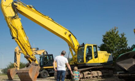 Dad, Toddler Equally Mesmerized By Excavator