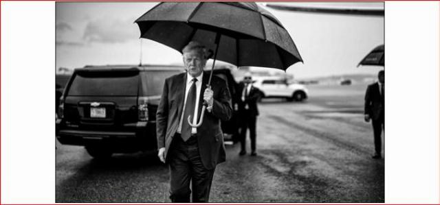 Trump with umbrella