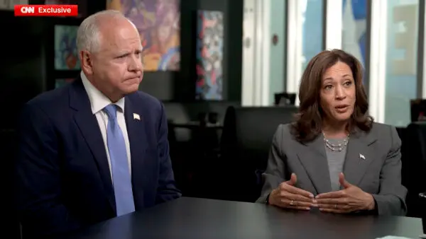 Vice President Kamala Harris (R) and her running mate Minnesota Gov. Tim Walz in a CNN interview, on Aug. 29, 2024. (CNN/Screenshot via The Epoch Times)