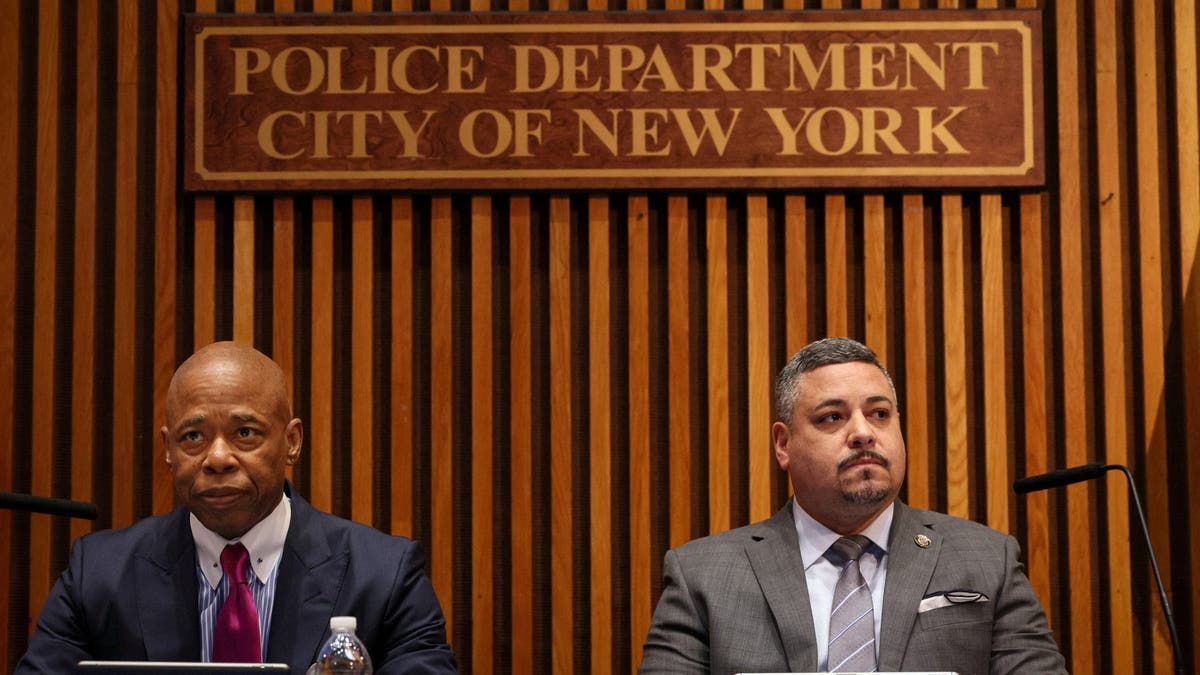 New York City Mayor Eric Adams and New York City Police Commissioner Edward Caban attend a news conference in New York