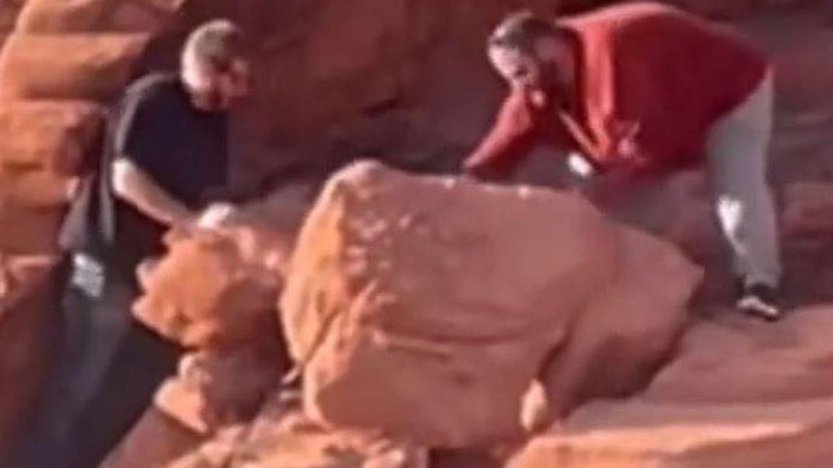 Image of people remove rocks 