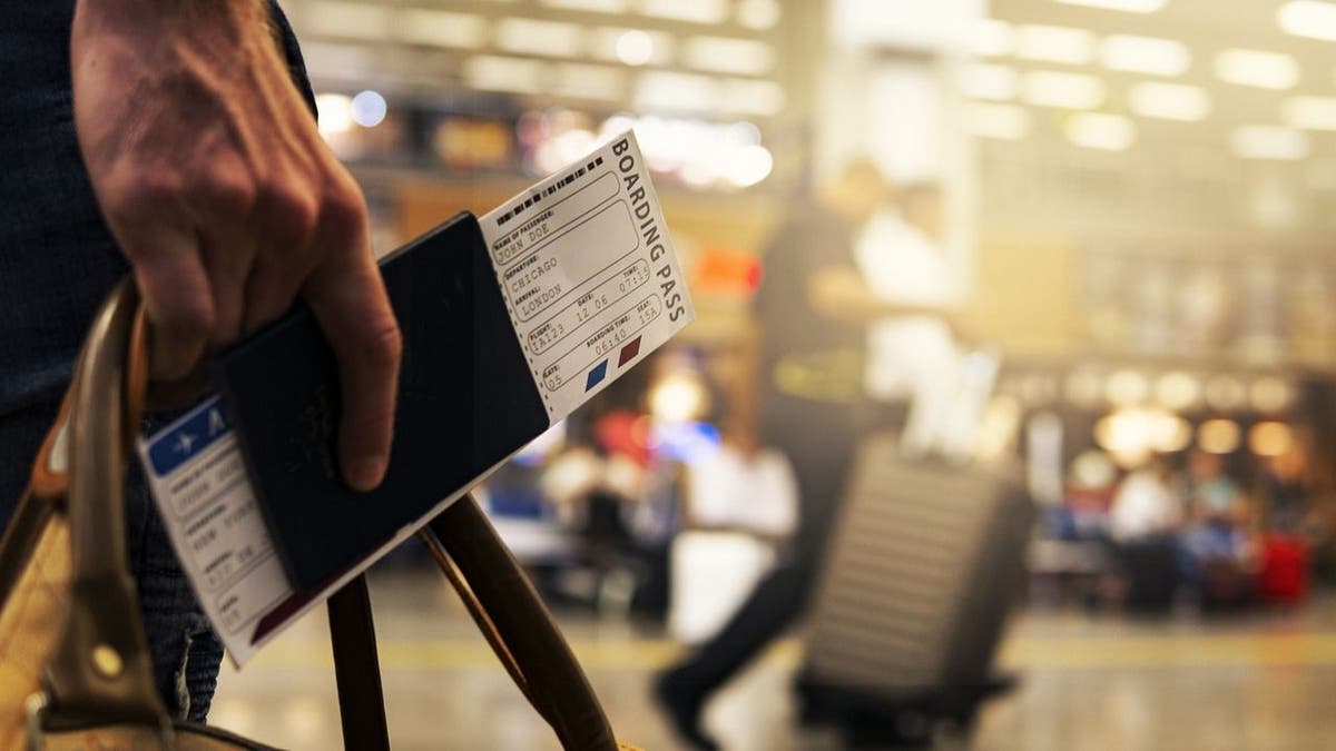 man holding passport