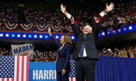 Oh No! Tim Walz Just Waved So Hard His Arms Flew Off!