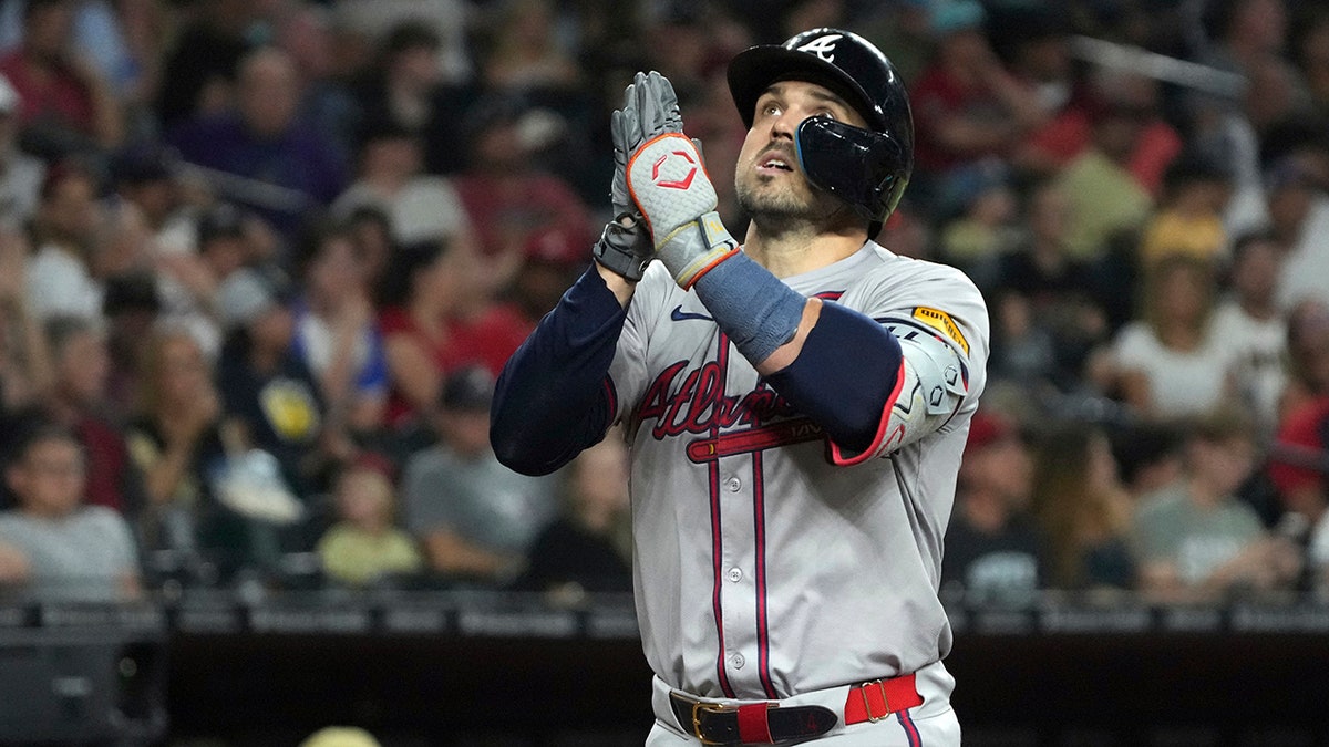 Adam Duvall celebrates home run