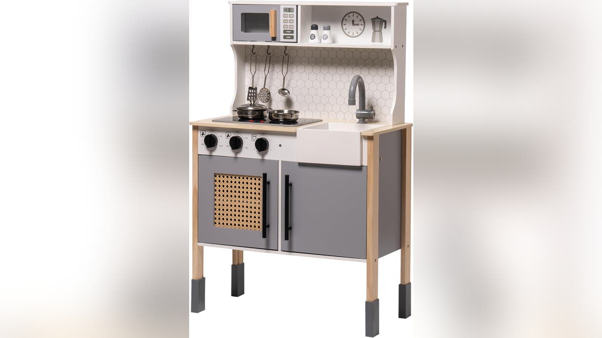 This delightful play kitchen is on sale. 