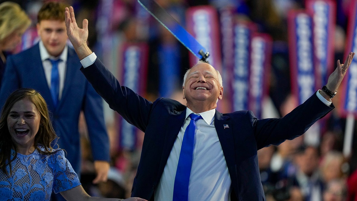 Tim Walz reacts during the Democratic National Convention