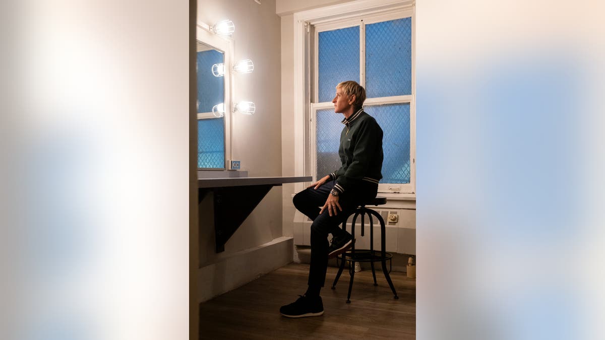 ellen looking in the mirror backstage at netflix special