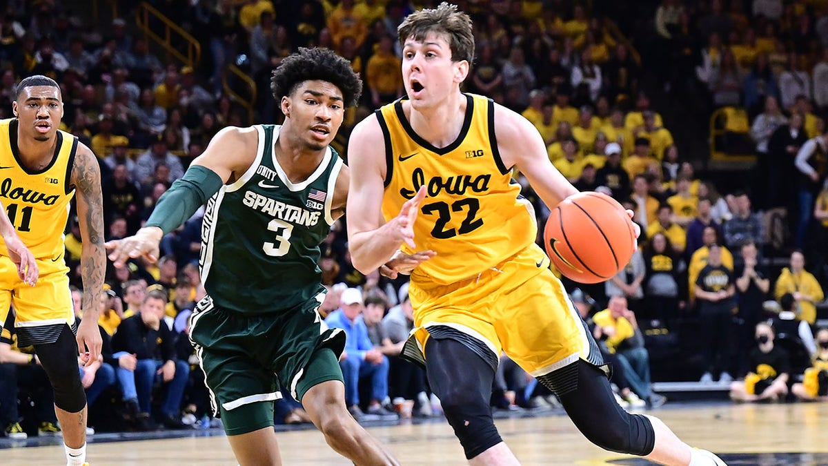 Patrick McCaffery drives against Michigan State