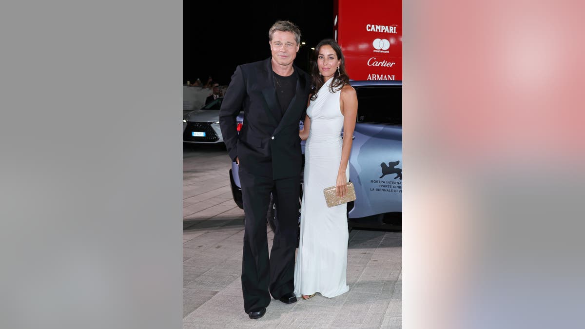 Brad Pitt and Ines de Ramon at the Venice Film Festival premiere of 