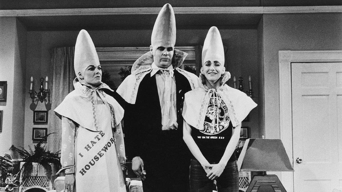 Jane Curtin, Dan Akroyd and Laraine Newman in a Coneheads sketch on 