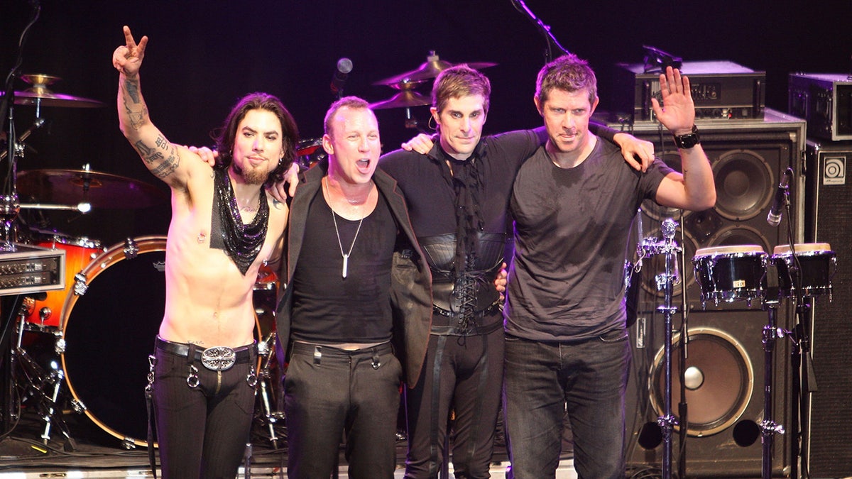 Dave Navarro, Stephen Perkins, Perry Farrell, and Eric Avery of Jane's ADdiction on stage