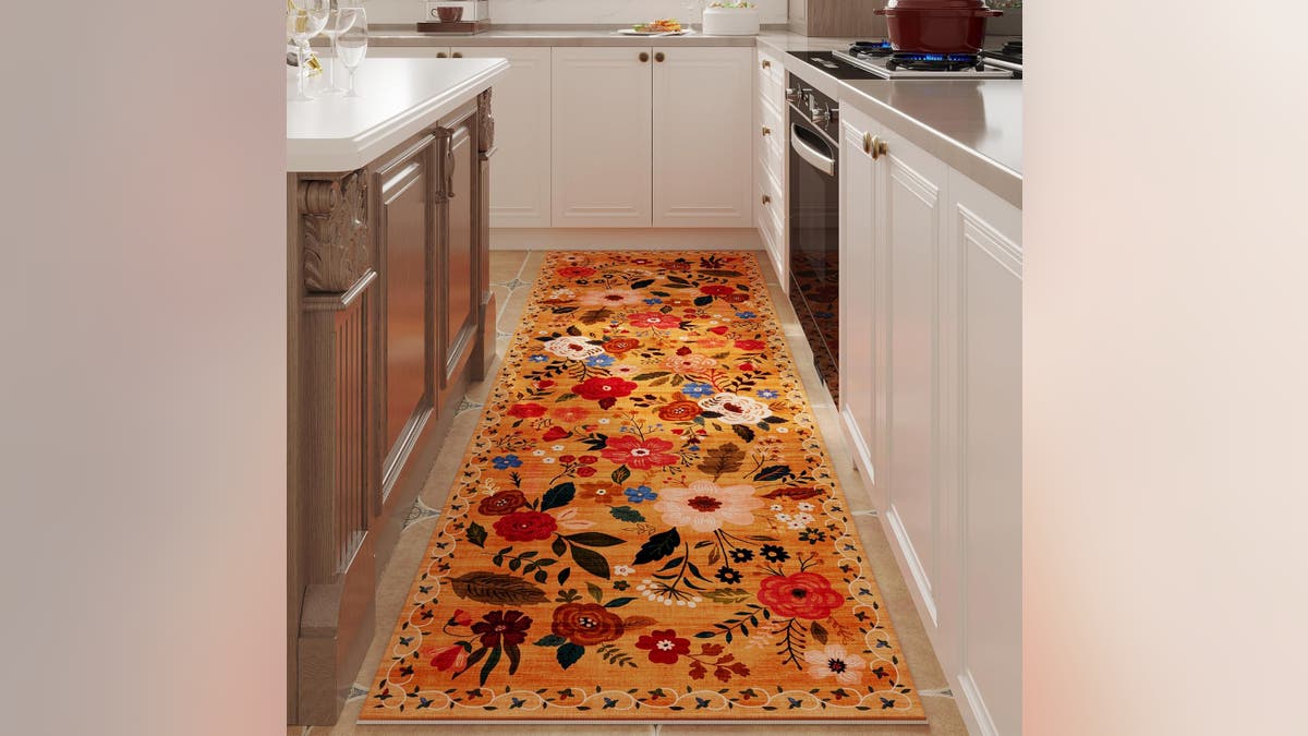 Add a carpet to an old kitchen floor for warmth.