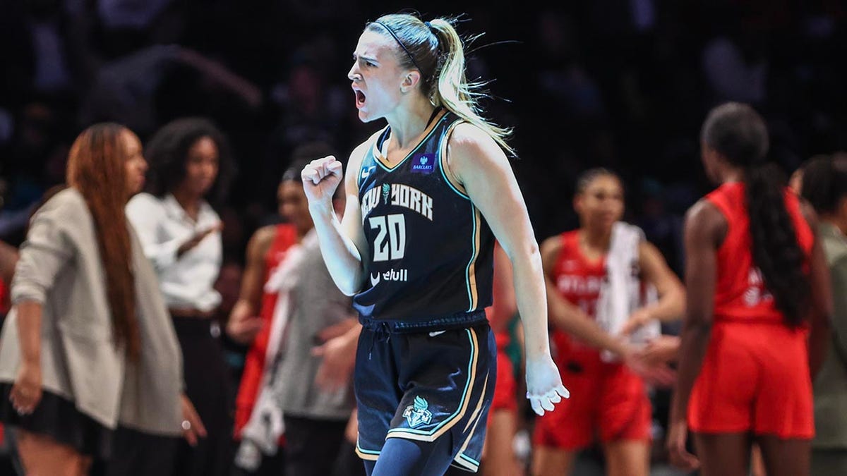 Sabrina Ionescu celebrates