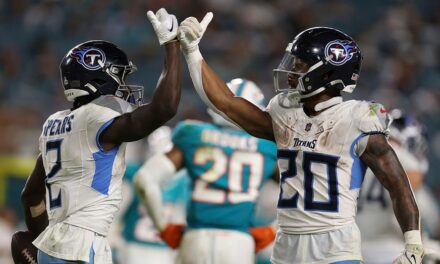 Titans pick up 1st win of season in ugly romp against Dolphins