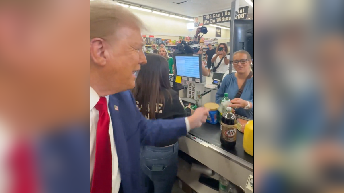 Trump hands money to shopper