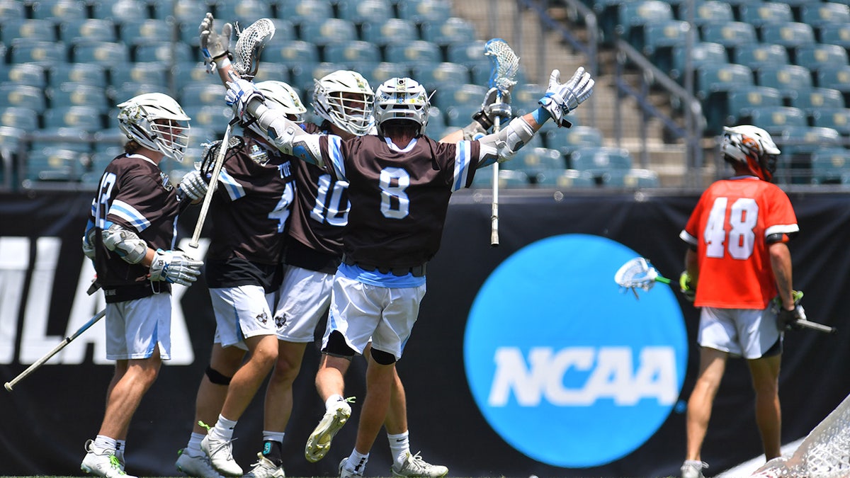 Tufts players celebrate