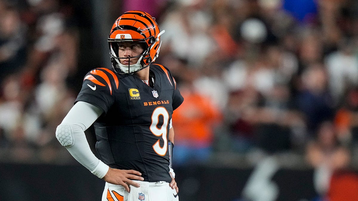 Cincinnati Bengals quarterback Joe Burrow, #9, stands by between plays in the second quarter of the NFL Week 3 game between the Cincinnati Bengals and the Washington Commanders at Paycor Stadium in Cincinnati on Monday, Sept. 23, 2024.