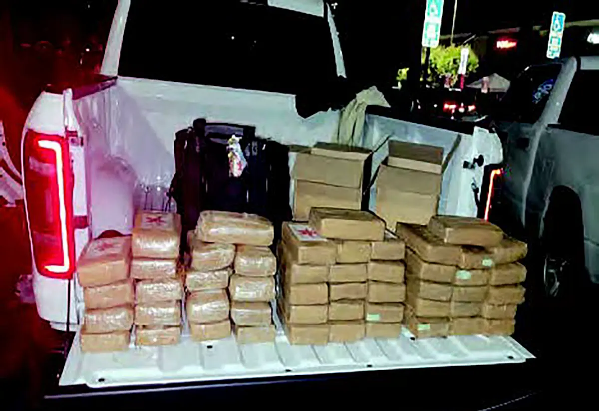 Confiscated drugs piled up in a truck bed. (U.S. District Attorney via AP)