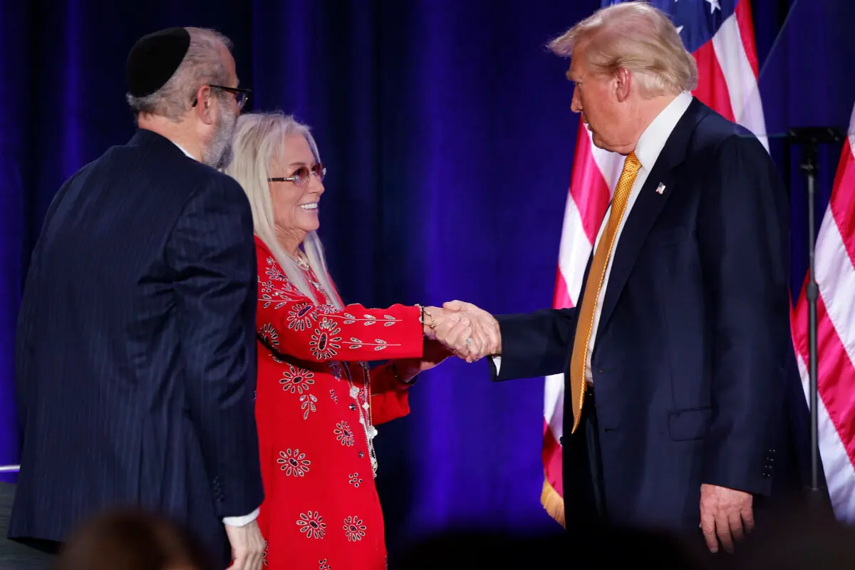 Former President Donald Trump thanks Miriam Adelson, widow of billionaire casino magnate Sheldon Adelson, and Rabbi Yehuda Kaploun at an event titled 