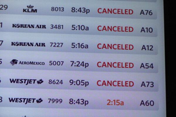 A departure board shows canceled flights at the Detroit Metropolitan Wayne County Airport, on July 20, 2024, in Detroit, Michigan. (Joe Raedle/Getty Images)