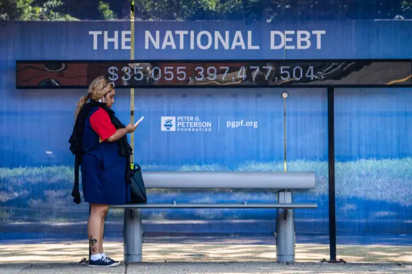 The national debt clock at a bus station in Washington, on Aug. 6, 2024. (Madalina Vasiliu/The Epoch Times)