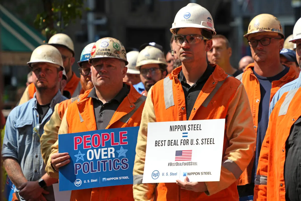 A rally by U.S. Steel employees is held outside the United Steel Tower in downtown Pittsburgh to display their support for the transaction with Nippon Steel on Sept. 4, 2024. (Gene J. Puskar/AP Photo)