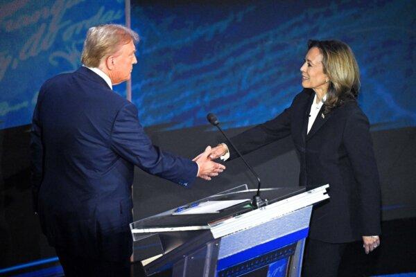 Former President Donald Trump (L) and Vice President Kamala Harris shake hands before the presidential debate at the National Constitution Center in Philadelphia on Sept. 10, 2024. (Saul Loeb/AFP via Getty Images)