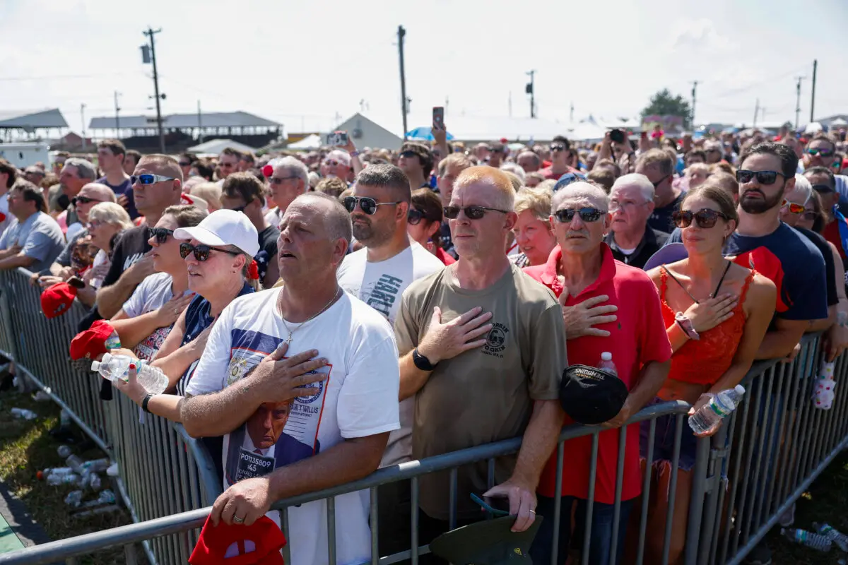 People participate in the pledge of allegiance at a campaign rally for Republican presidential candidate and former U.S. President Donald Trump, at Butler Farm Show Inc. in Butler, Pa., July 13, 2024. (Anna Moneymaker/Getty Images)