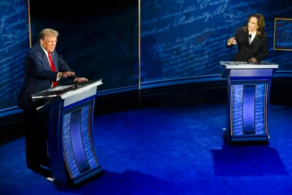 Former President Donald Trump (L) and Vice President Kamala Harris speak during a presidential debate at the National Constitution Center in Philadelphia on Sept. 10, 2024. (Saul Loeb/AFP via Getty Images)