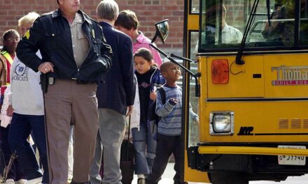 Library media teacher arrested after video recorded him putting 6-year-old in a headlock, police say