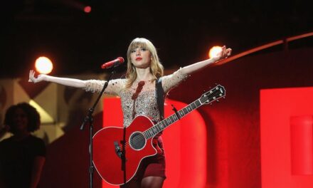 Boomer takes hammer to guitar with Taylor Swift autograph after dropping $4,000 on it as fellow Texans roar with approval