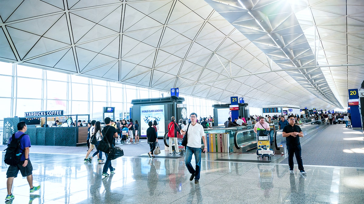 travelers in an airport