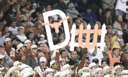 Texas Longhorn Fan Is Completely Unaware That Her Young Child Is Repeatedly Sipping Off Her Beer During Game