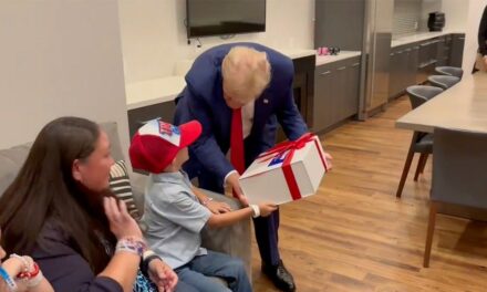 SEE IT: Trump meets young supporter with rare brain disease backstage at rally