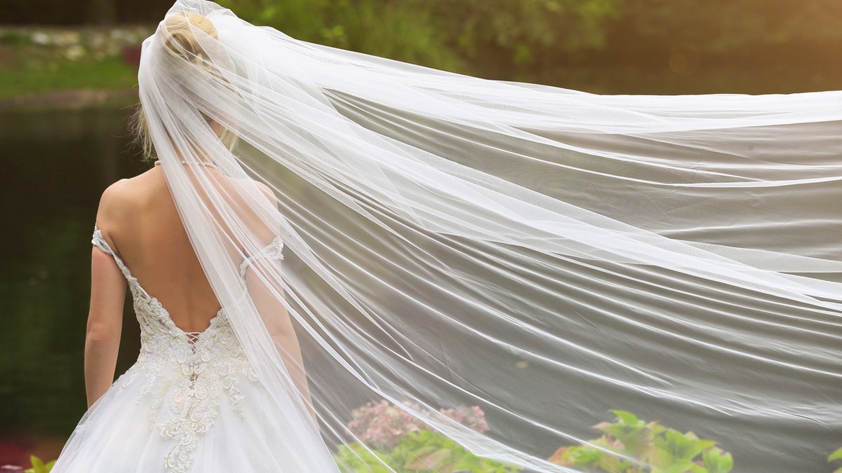 A wedding veil blowing in the wind