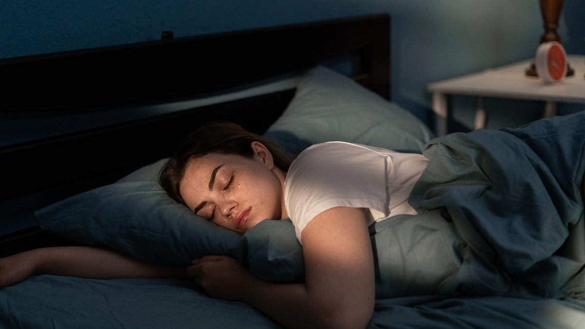 A woman sleeping in bed 