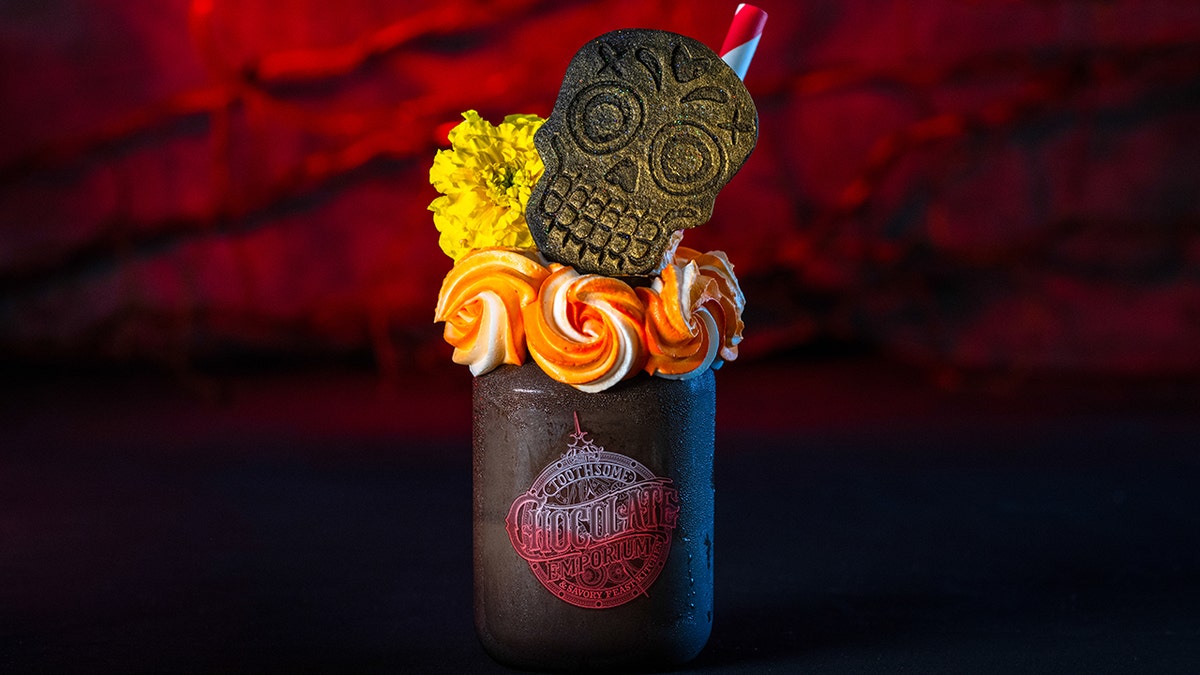 Milkshake with a skull cookie in it.