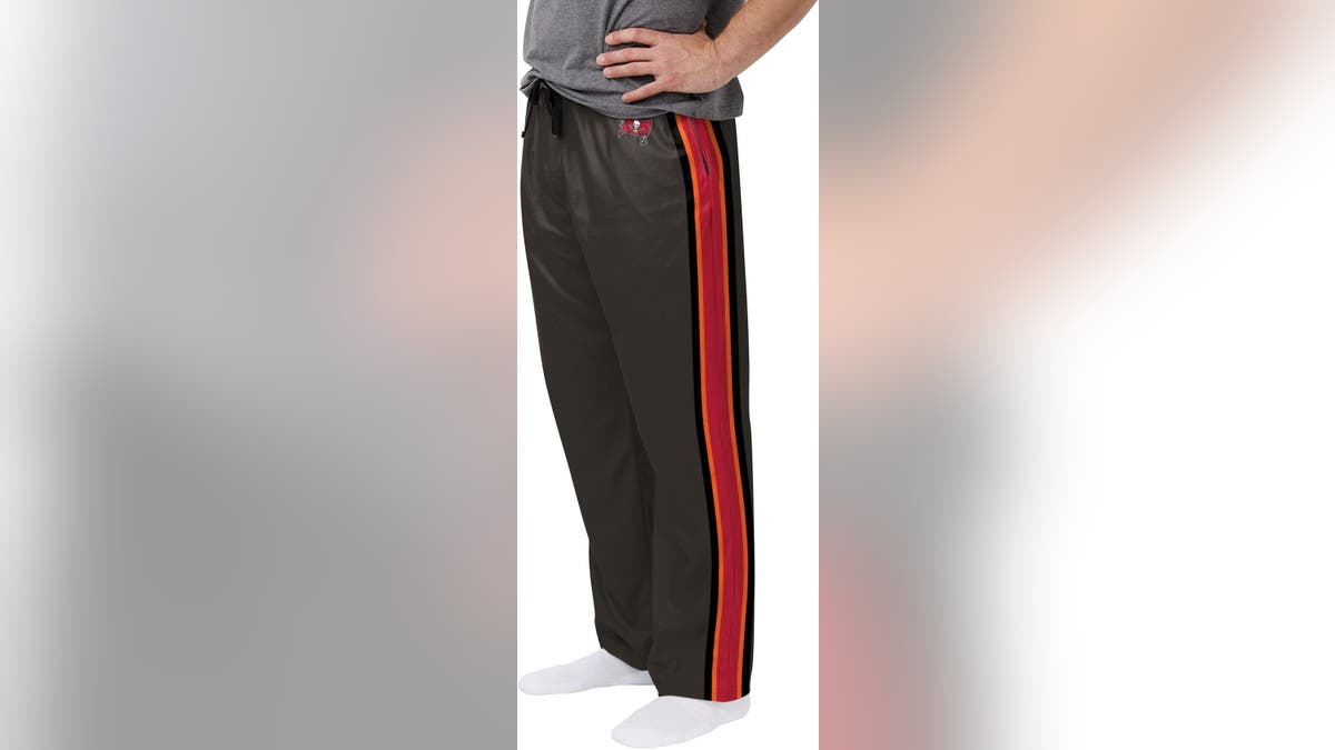 Settle in for the game anywhere with a comfy pair of NFL sweatpants. 